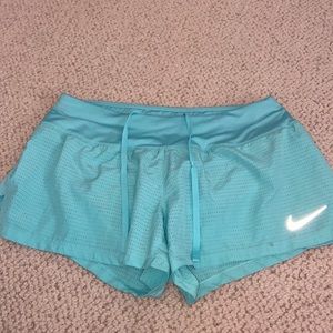 Nike Dri-Fit aqua blue athletic shorts